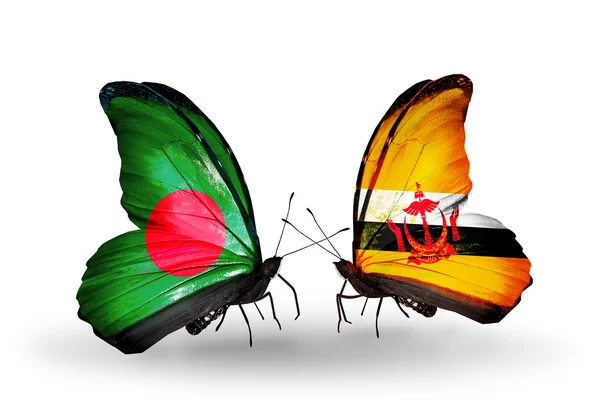 Mariposas con banderas de Bangladesh y Brunei en alas — Foto de Stock