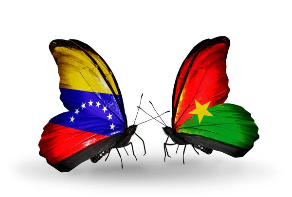 蝴蝶翅膀上的委内瑞拉和布吉纳法索标志 — 图库照片