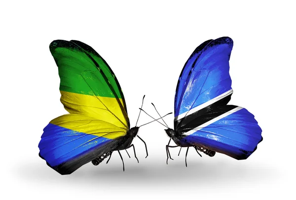 Butterflies with Gabon and  Botswana flags on wings — Stock Photo, Image