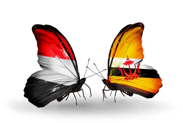 Πεταλούδες με την Υεμένη και το Μπρουνέι σημαίες με φτερά — Φωτογραφία Αρχείου