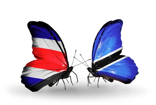 Butterflies with Costa Rica and Botswana flags on wings — Stock Photo, Image