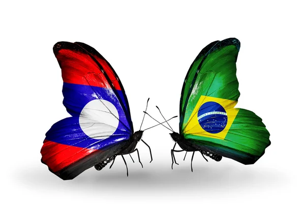 Mariposas con banderas de Laos y Brasil en alas — Foto de Stock