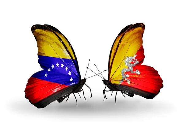 Papillons avec drapeaux du Venezuela et du Bhoutan sur les ailes — Photo