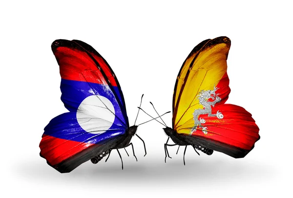 Butterflies with Laos and Bhutan flags on wings — Stock Photo, Image