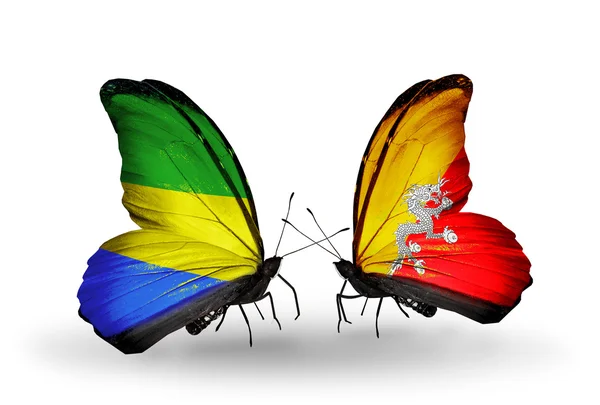 Papillons avec drapeaux Gabon et Bhoutan sur les ailes — Photo