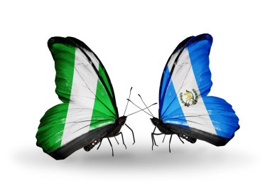 Kelebek kanatları üzerinde Nijerya ve guatemala bayrağı ile
