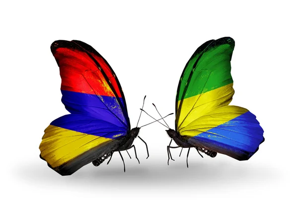 Butterflies with Armenia and  Gabon flags on wings — Stock Photo, Image