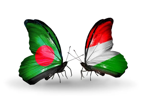 Vlinders met bangladesh en Hongarije vlaggen op vleugels — Stockfoto