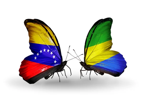 蝴蝶翅膀上的委内瑞拉和加蓬标志 — 图库照片