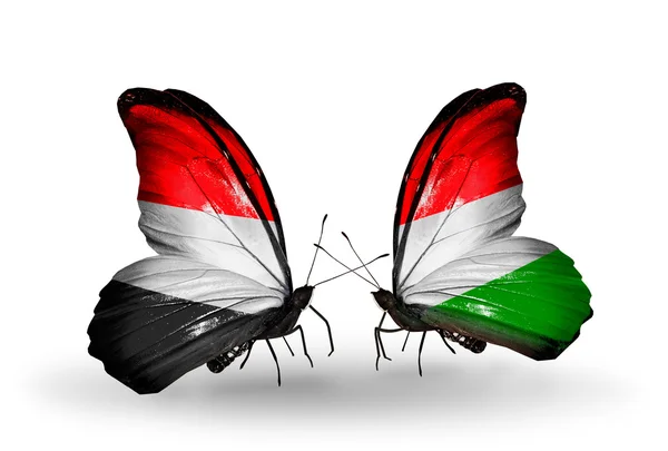 Butterflies with Yemen and  Hungary flags on wings — Stock Photo, Image