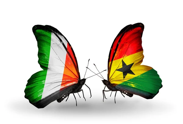 Butterflies with Ireland and Ghana flags on wings — Stock Photo, Image