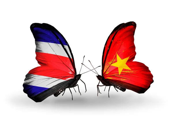 Mariposas con banderas de Costa Rica y Vietnam en alas — Foto de Stock