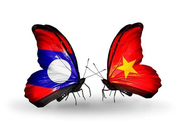 Borboletas com bandeiras do Laos e Vietnã nas asas — Fotografia de Stock