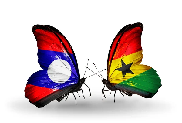 Schmetterlinge mit laotischen und ghanaischen Flaggen auf Flügeln — Stockfoto
