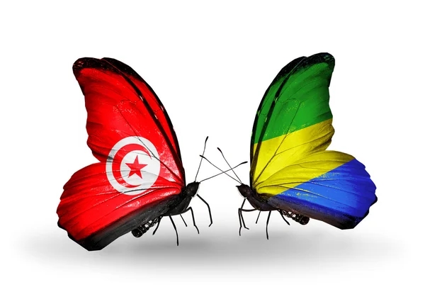 Papillons avec drapeaux Tunisie et Gabon sur les ailes — Photo