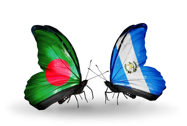 Papillons avec drapeaux Bangladesh et Guatemala sur les ailes — Photo