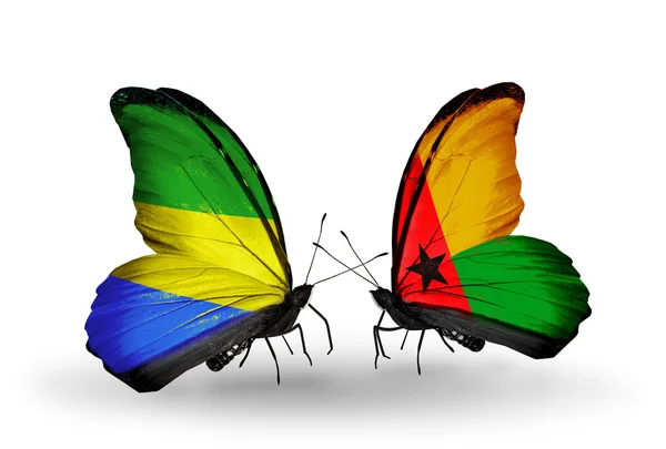 Papillons avec drapeaux Gabon et Guinée Bissau sur les ailes — Photo