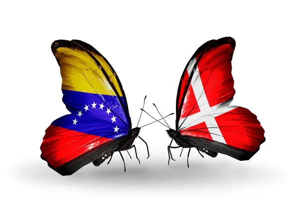 Borboletas com bandeiras Venezuela e Dinamarca em asas — Fotografia de Stock