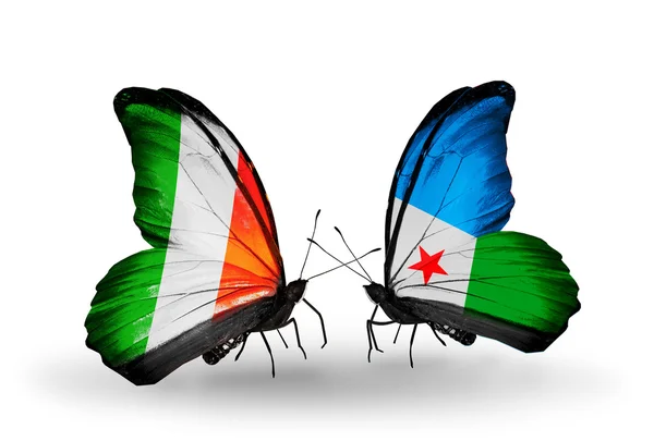 Papillons avec l'Irlande et Djibouti drapeaux sur les ailes — Photo