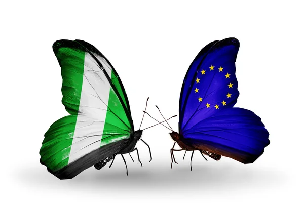 Mariposas con Nigeria y banderas de la Unión Europea en alas —  Fotos de Stock