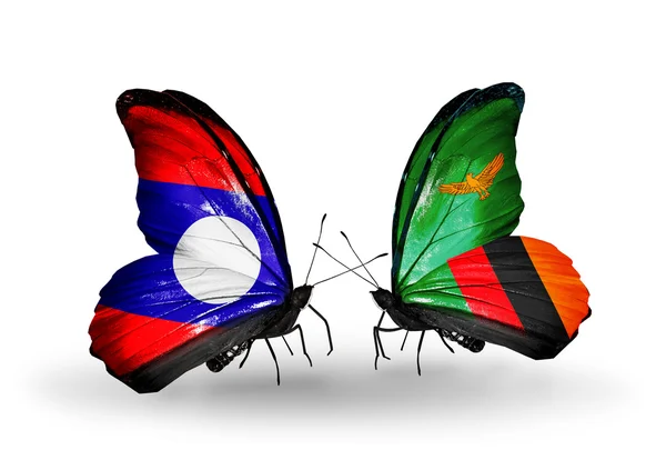 Mariposas con banderas de Laos y Zambia en alas — Foto de Stock