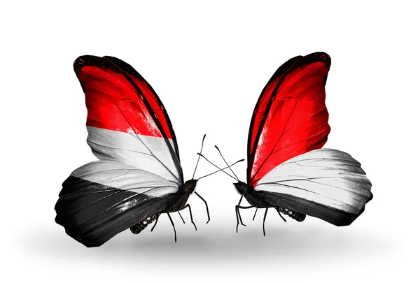 Mariposas con Yemen y Mónaco, Indonesia banderas con alas — Foto de Stock