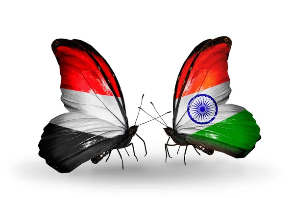 Mariposas con banderas de Yemen e India en alas —  Fotos de Stock