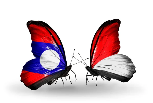 Butterflies with Laos and Monaco, Indonesia flags on wings — Stock Photo, Image