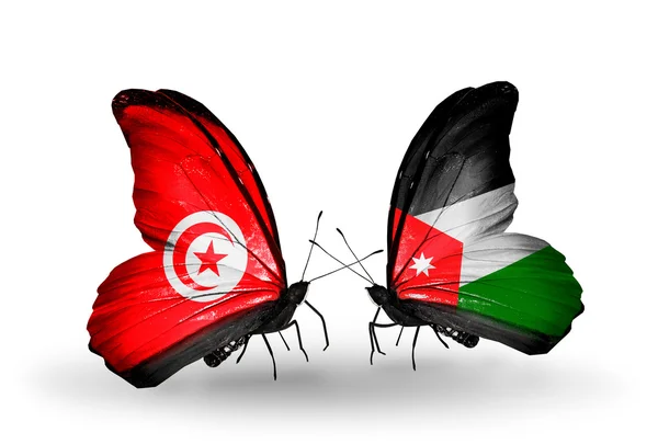 Butterflies with Tunisia and Jordan flags on wings — Stock Photo, Image