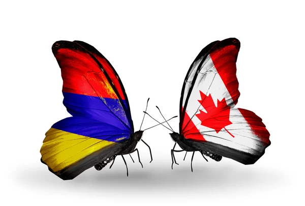Kelebekler kanat Ermenistan ve Kanada bayrakları ile — Stok fotoğraf