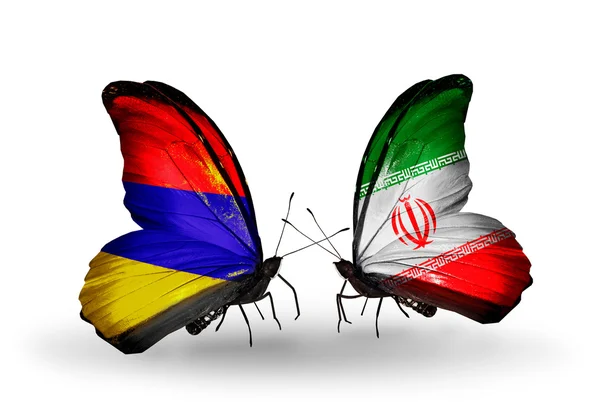 Schmetterlinge mit Armenien und iranischen Flaggen auf Flügeln — Stockfoto