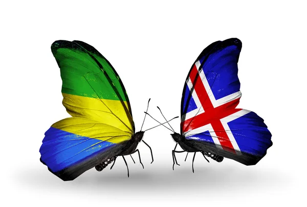 Butterflies with Gabon and Iceland flags on wings — Stock Photo, Image