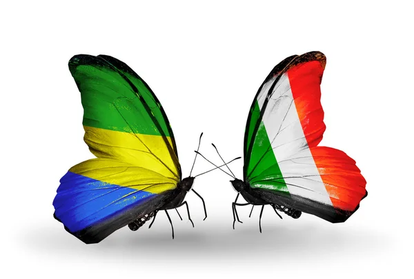 Butterflies with Gabon and Ireland flags on wings — Stock Photo, Image