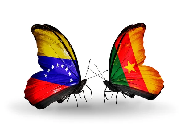 Papillons avec drapeaux du Venezuela et du Cameroun sur les ailes — Photo