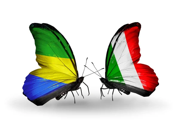 Butterflies with Gabon and Italy flags on wings — Stock Photo, Image