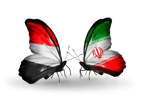 Farfalle con bandiera yemenita e iraniana sulle ali — Foto Stock