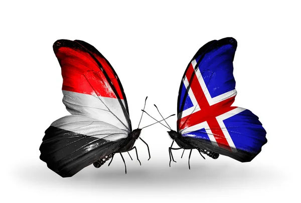 Butterflies with Yemen and   Iceland flags on wings — Stock Photo, Image