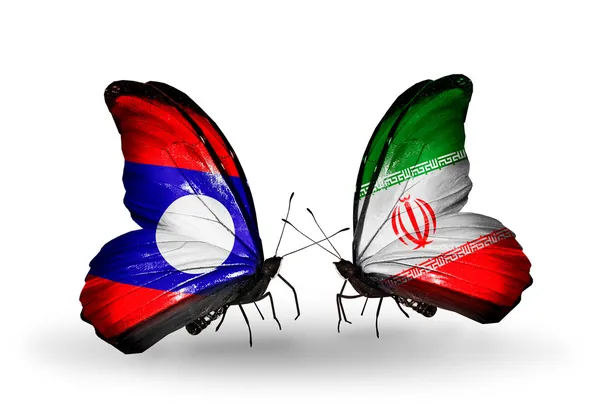 Schmetterlinge mit laotischen und iranischen Flaggen auf Flügeln — Stockfoto