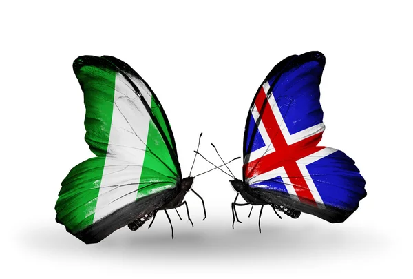 Butterflies with Nigeria and   Iceland flags on wings — Stock Photo, Image