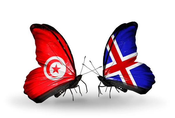 Butterflies with Tunisia and Iceland flags on wings — Stock Photo, Image