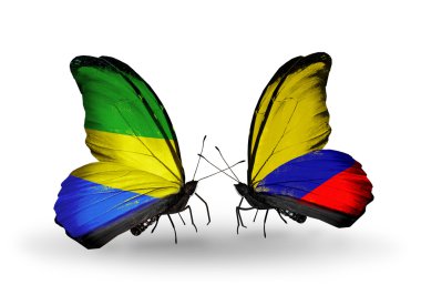 Kelebek kanatları üzerinde gabon ve columbia bayraklı