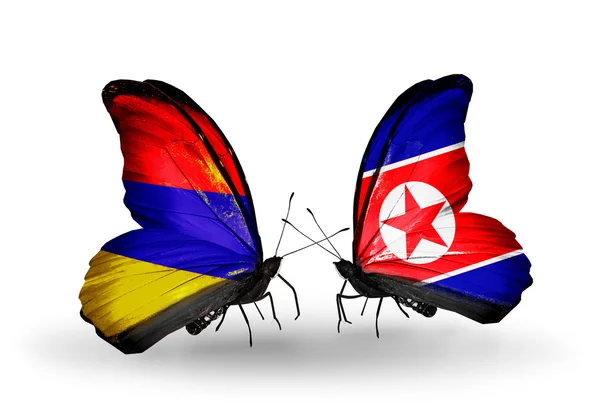 Butterflies with Armenia and  North Korea flags on wings — Stock Photo, Image