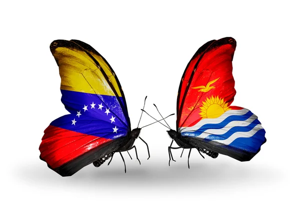 Motýli s Venezuelou a kiribati vlajky na křídlech — Stock fotografie