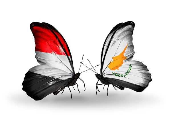 Motyle z Jemenu i Cypr flagi na skrzydłach — Zdjęcie stockowe