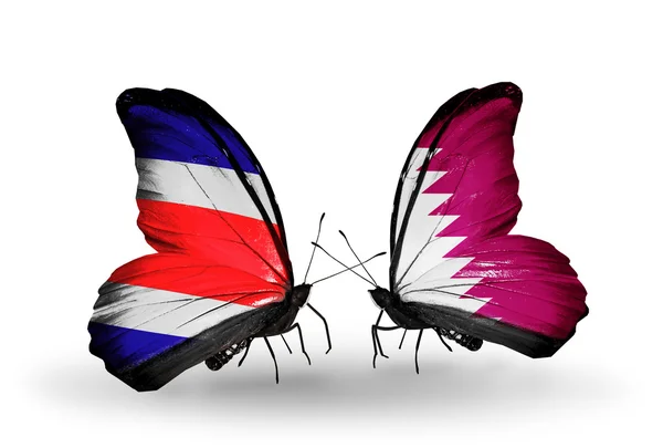 Butterflies with Costa Rica and  Qatar flags on wings — Stock Photo, Image