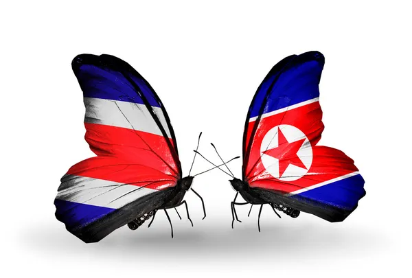 Mariposas con banderas de Costa Rica y Corea del Norte en alas — Foto de Stock