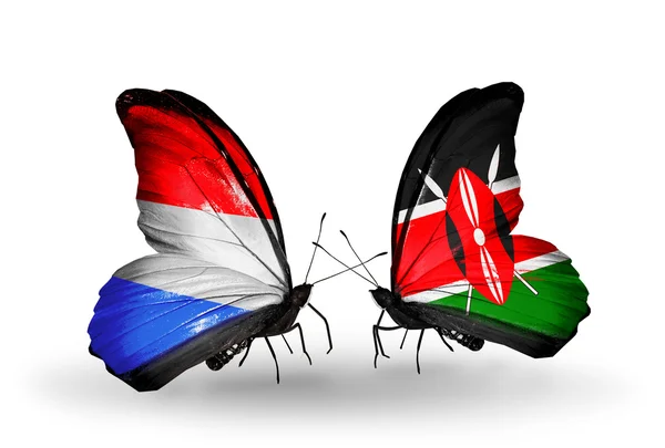 Butterflies with Luxembourg and Kenya flags on wings — Stock Photo, Image