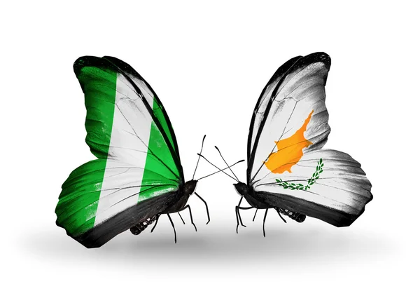 Butterflies with Nigeria and  Cyprus flags on wings — Stock Photo, Image