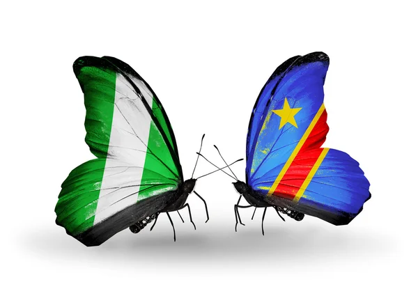 Vlinders met nigeria en kongo vlaggen op vleugels — Stockfoto