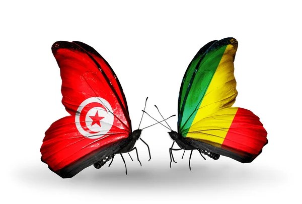 Fjärilar med Tunisien och kongo flaggor på vingar — Stockfoto